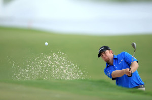 DORAL, FL - MARCH 07:  J.B.Holmes of the USA plays his fourth shot on the par 5, 10th hole during the third round of the World Golf Championships-Cadillac Championship at Trump National Doral Blue Monster Course on March 7, 2015 in Doral, Florida.  (Photo by David Cannon/Getty Images)